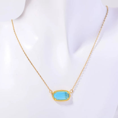 Elegant Gold Tone March Birthstone Necklace